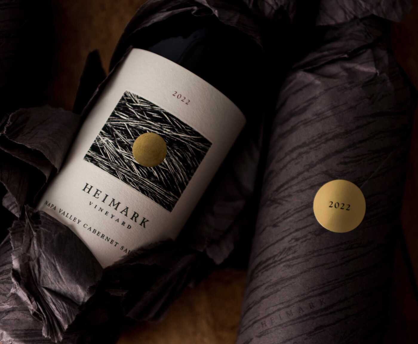 Photo of two 2022 Heimark Vineyard Cabernet Sauvignon bottle
